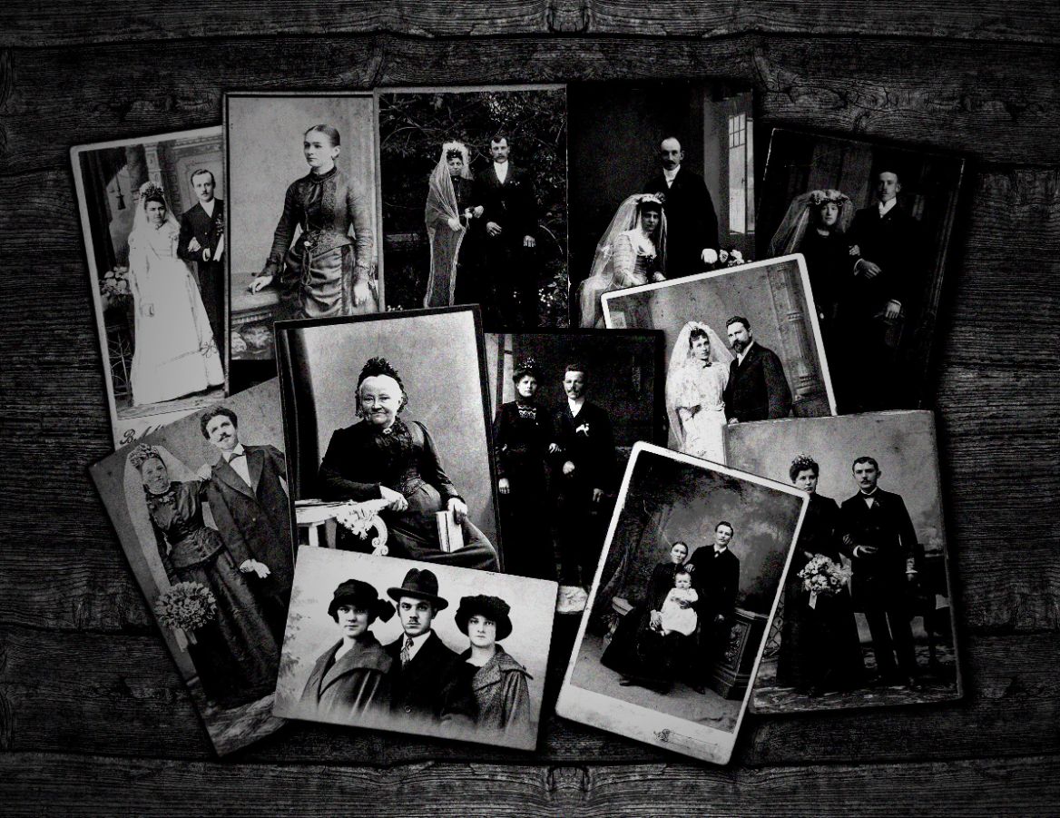 old family photos covering a table