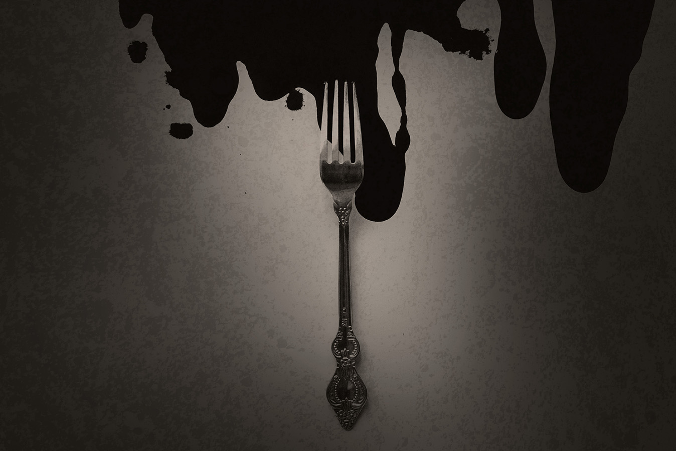 fork on top of dripping blood