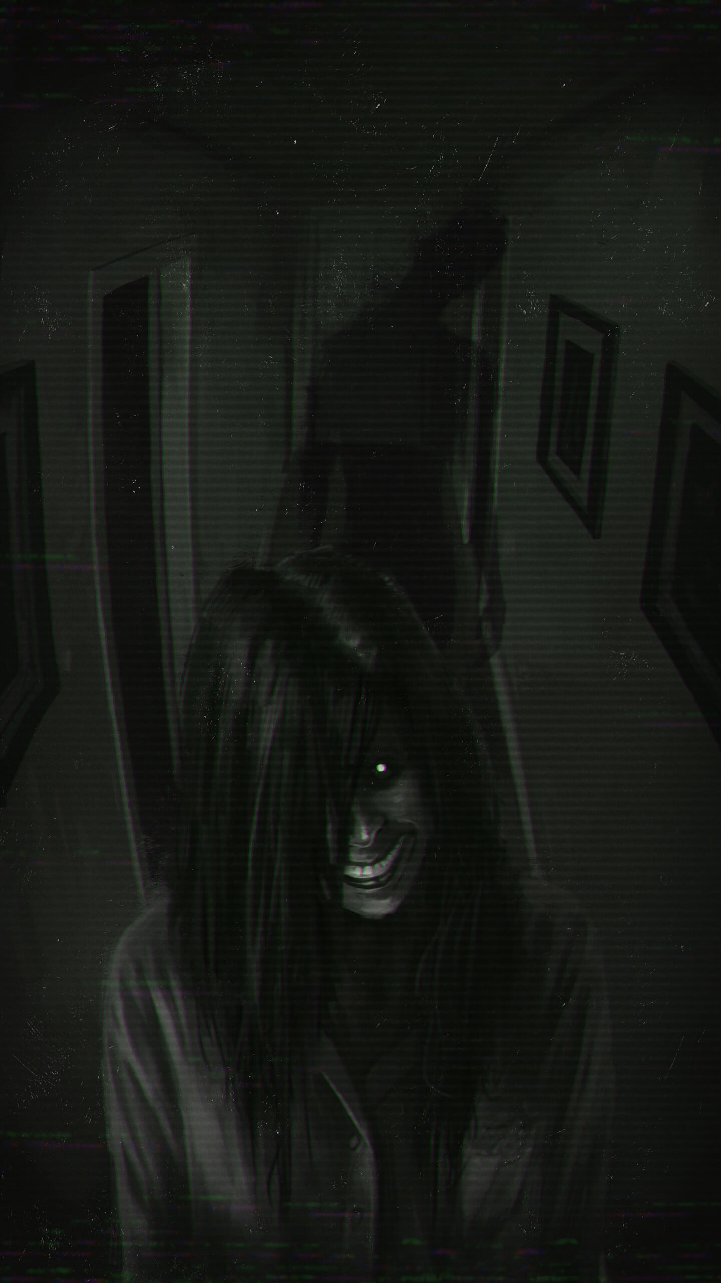 a long-haired figure with a pale grinning face in a dark hallway, a tall shadow looming behind