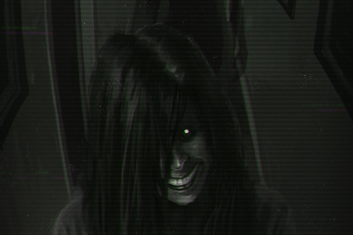 805-Unauthorized-Presence-Header a long-haired figure with a pale grinning face in a dark hallway, a tall shadow looming behind